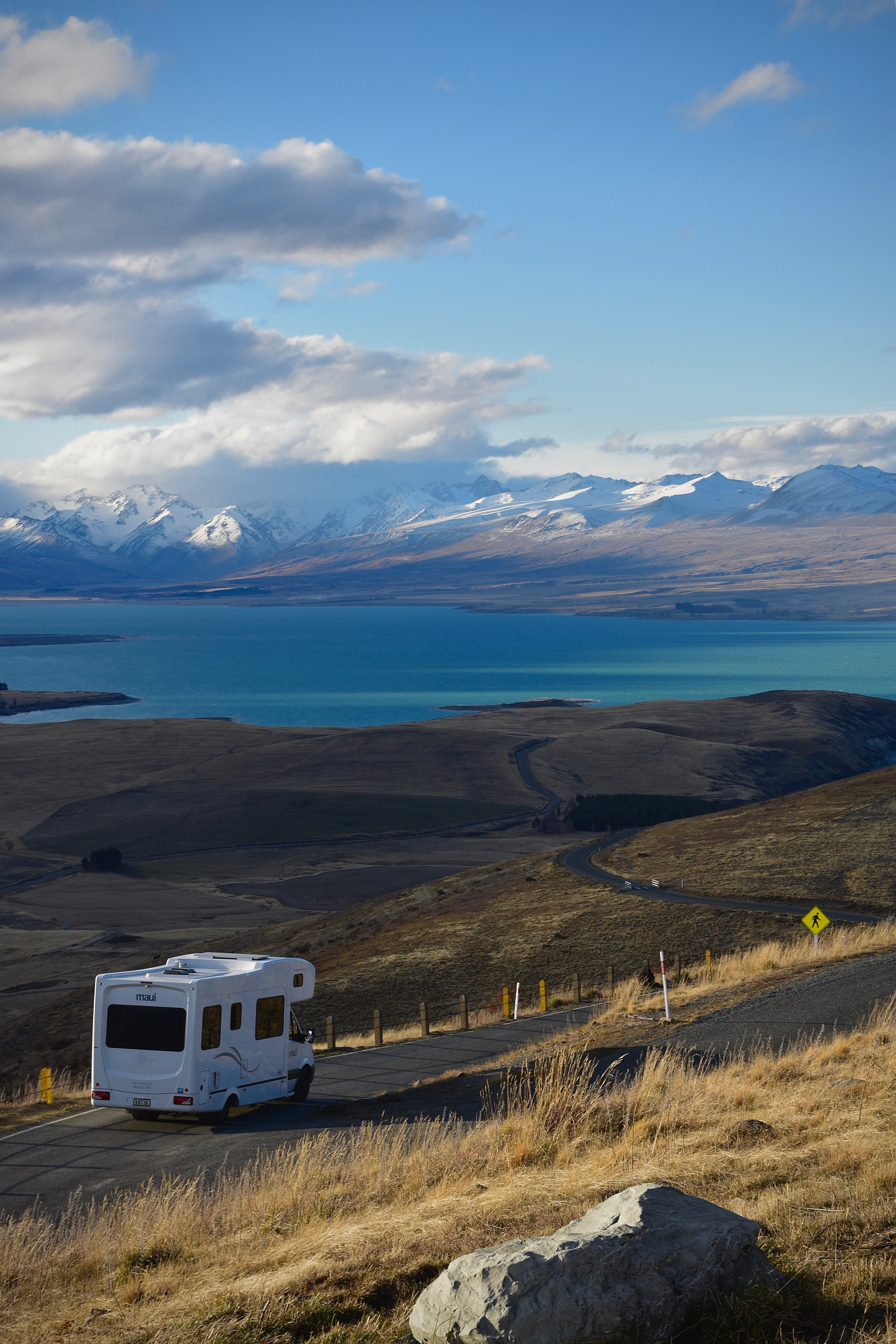 Motorhome driving on open road.